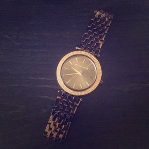 MK gold women’s watch
